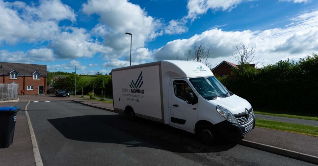 Simply Moving removal van parked on a residential street
